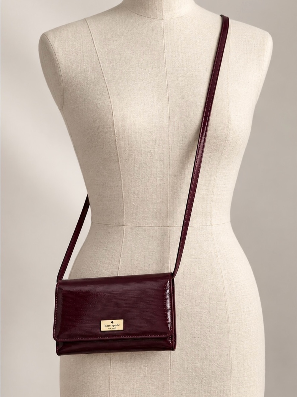 kate spade Burgundy Leather Crossbody Wallet with Gold Plate